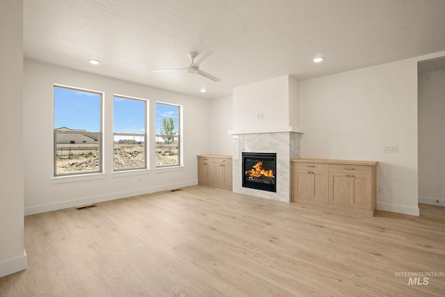 1724 Black Elm, Star, ID 83669 - unfurnished living room with a fireplace, ceiling fan, light wood-type flooring, and recessed lighting