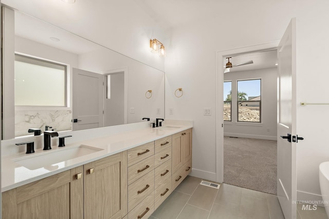 1724 Black Elm, Star, ID 83669 - full bath with double vanity, tile patterned floors, a ceiling fan, and a freestanding bath