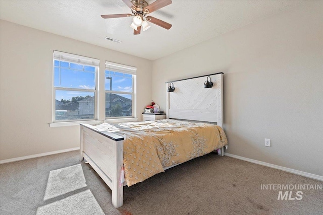 bedroom featuring ceiling fan and carpet flooring