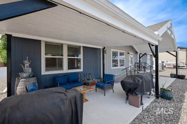 view of patio / terrace with area for grilling and an outdoor living space
