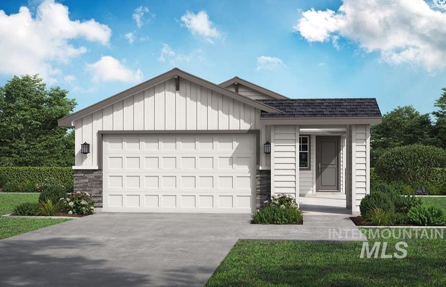 view of front of property with stone siding, driveway, an attached garage, and roof with shingles
