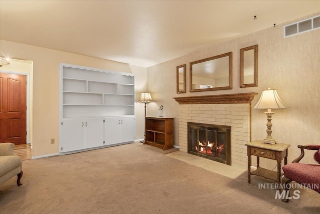 interior space featuring a brick fireplace