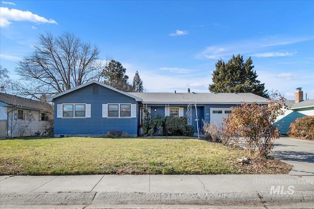 ranch-style home with a garage and a front lawn