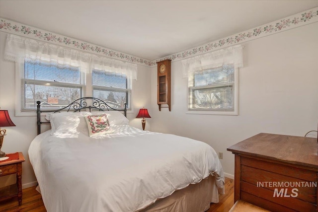 bedroom featuring hardwood / wood-style flooring