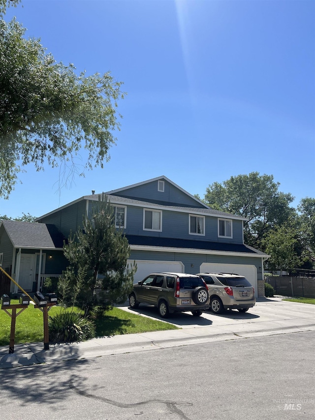 front facade with a garage