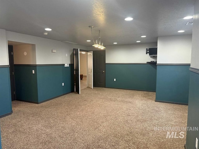 basement with carpet and recessed lighting