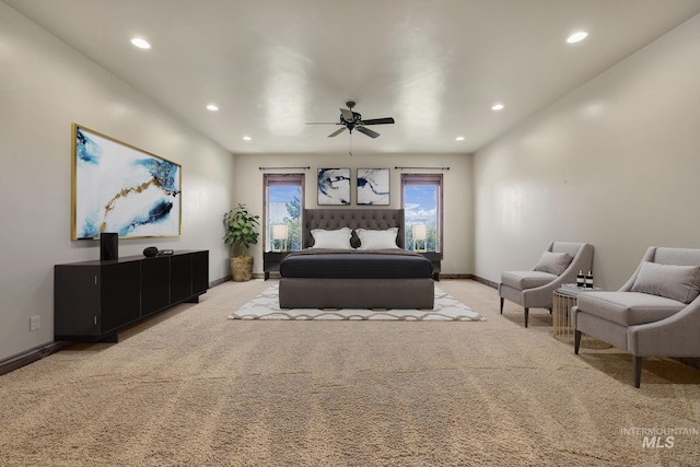 carpeted bedroom featuring recessed lighting, a ceiling fan, and baseboards