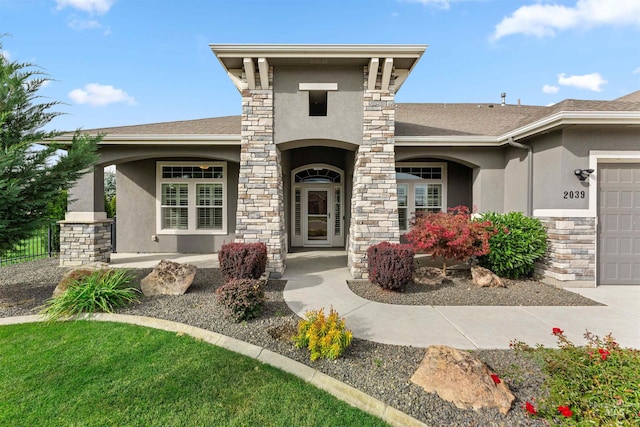 view of front of property featuring a garage