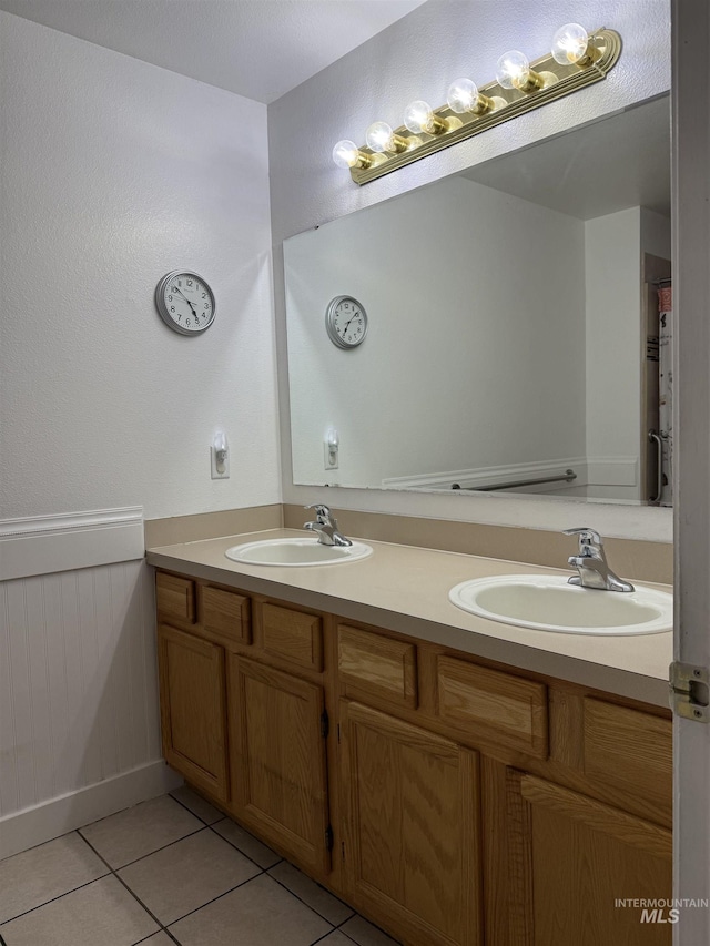 bathroom featuring vanity and tile patterned flooring