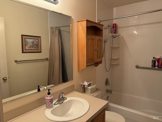 full bathroom featuring vanity, shower / tub combo with curtain, and toilet