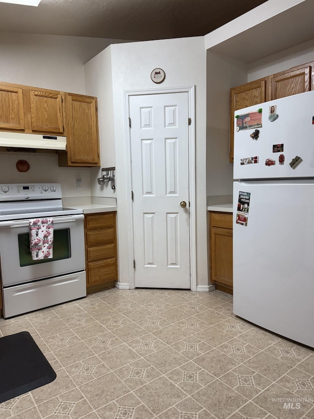 kitchen featuring white appliances