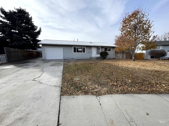 ranch-style home with a garage