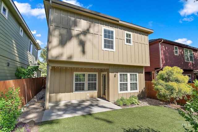 2174 S Myers Pl, Boise, ID 83706 - view of front of house with board and batten siding and a patio