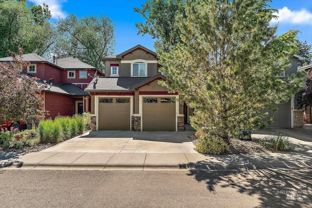 2174 S Myers Pl, Boise, ID 83706 - view of front facade featuring stone siding, concrete driveway, and a garage