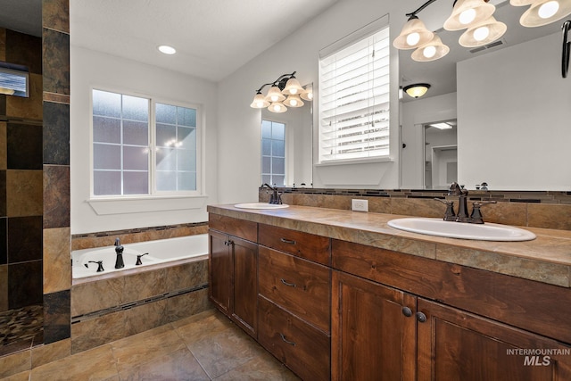 2174 S Myers Pl, Boise, ID 83706 - bathroom with a bath, plenty of natural light, and double vanity