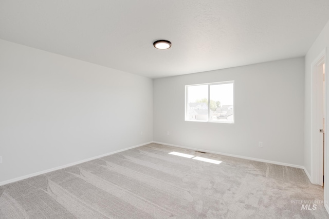 7367 E Marble Springs Dr, Nampa, ID 83687 - empty room with light colored carpet and baseboards