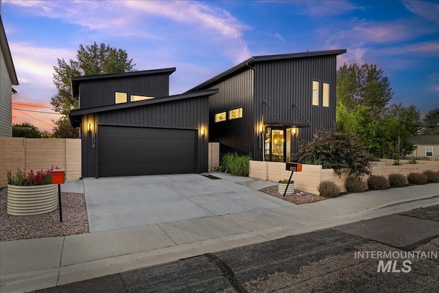 contemporary house featuring a garage