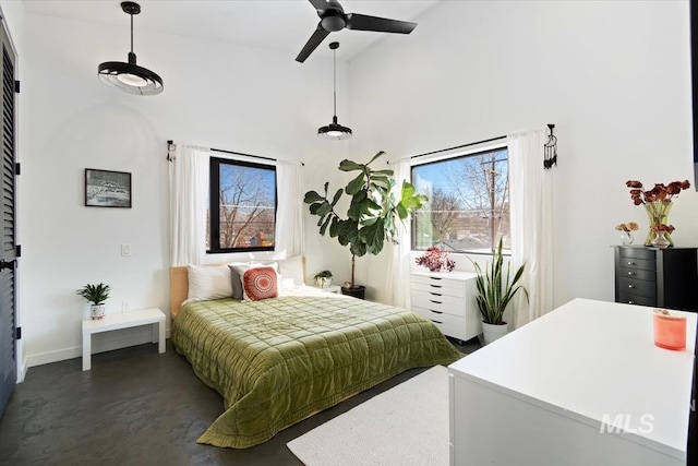bedroom featuring a high ceiling