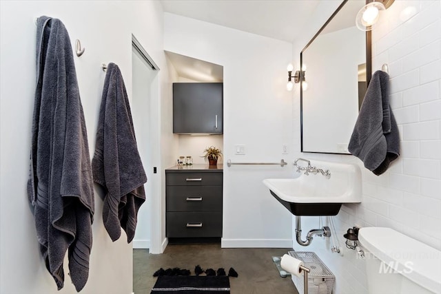 bathroom with sink and toilet
