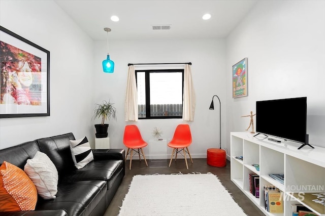 living room featuring dark hardwood / wood-style flooring