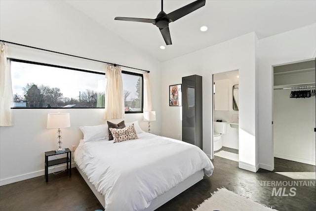 bedroom with multiple windows, vaulted ceiling, ceiling fan, and ensuite bathroom