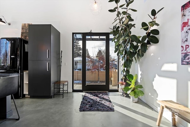 entryway with concrete flooring