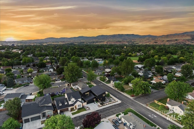 aerial view at dusk with a mountain view