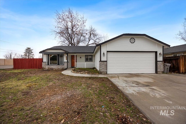 ranch-style house with a front yard and a garage