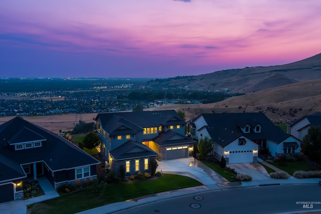 aerial view at dusk with a mountain view