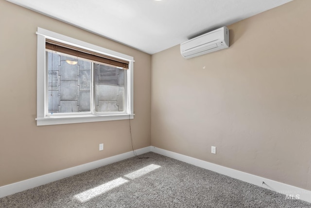 carpeted empty room featuring a wall mounted AC and baseboards