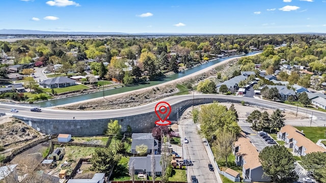 aerial view with a residential view and a water view