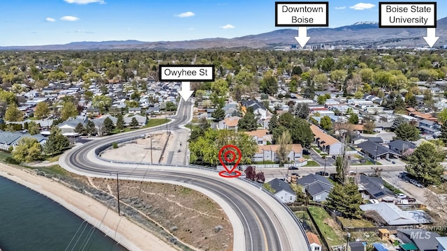 drone / aerial view featuring a mountain view and a residential view