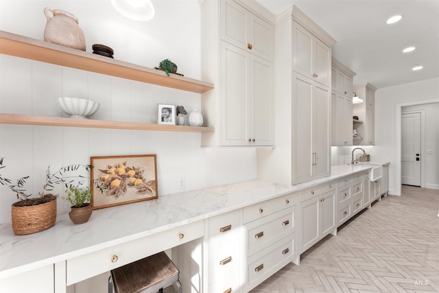 1734 S S Riparian Way, Eagle, ID 83616 - kitchen with open shelves, a sink, recessed lighting, and light stone countertops
