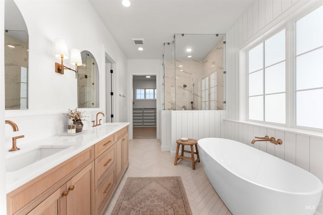 1734 S S Riparian Way, Eagle, ID 83616 - full bathroom featuring a marble finish shower, a freestanding bath, double vanity, and recessed lighting