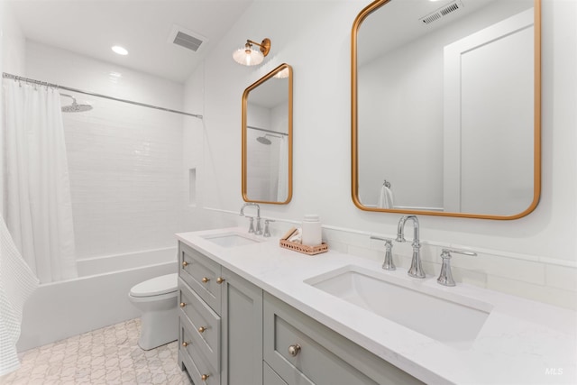 1734 S S Riparian Way, Eagle, ID 83616 - full bathroom with double vanity, shower / bath combination with curtain, toilet, and recessed lighting