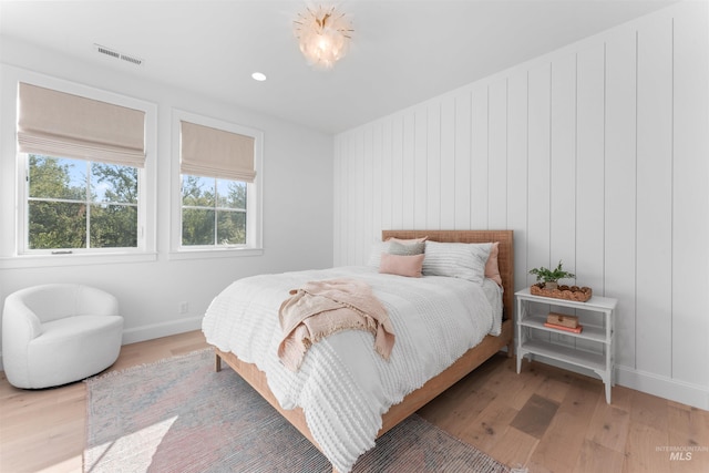 1734 S S Riparian Way, Eagle, ID 83616 - bedroom featuring light wood-style floors, baseboards, and recessed lighting