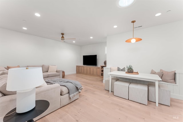 1734 S S Riparian Way, Eagle, ID 83616 - living area with wood finished floors, recessed lighting, ceiling fan, and baseboards