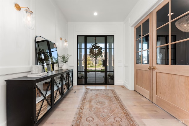 1734 S S Riparian Way, Eagle, ID 83616 - foyer featuring wood finished floors, a decorative wall, and recessed lighting