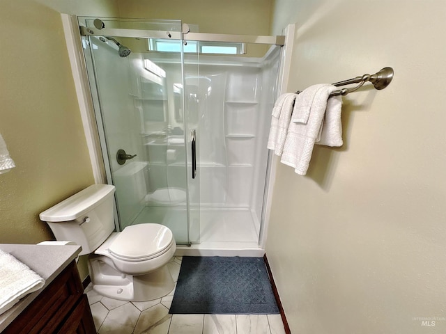 600 N 9th E, Mountain Home, ID 83647 - full bath with a shower stall, vanity, toilet, and tile patterned flooring