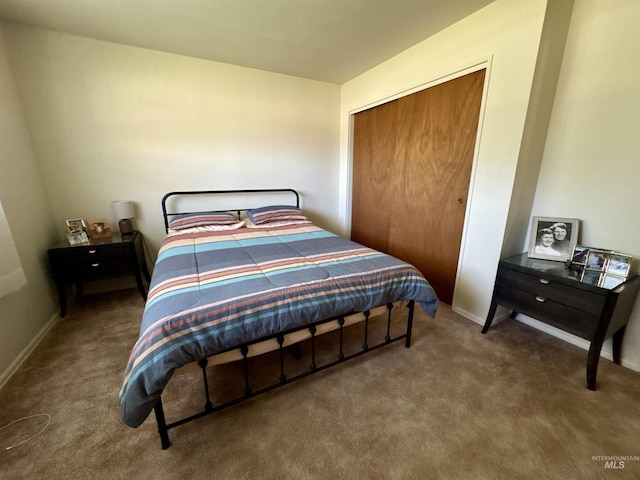 600 N 9th E, Mountain Home, ID 83647 - carpeted bedroom with a closet and baseboards