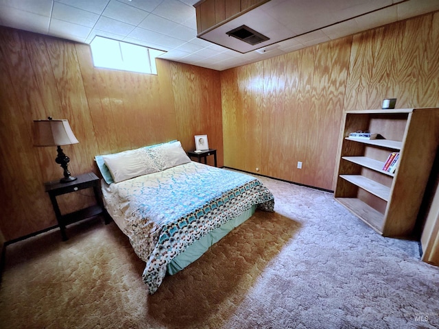 600 N 9th E, Mountain Home, ID 83647 - bedroom with carpet flooring and wooden walls
