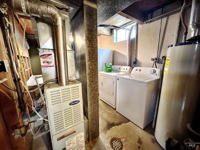 600 N 9th E, Mountain Home, ID 83647 - laundry room with water heater and washer and dryer