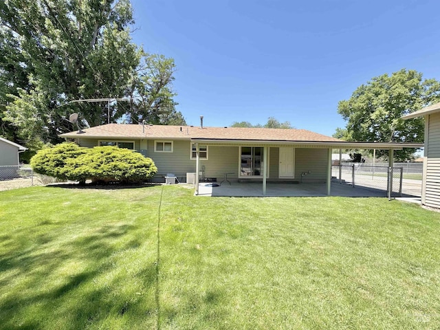 600 N 9th E, Mountain Home, ID 83647 - rear view of house with a patio area and cooling unit