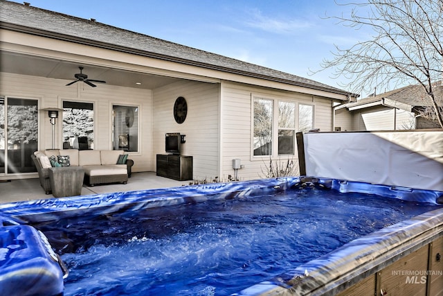 exterior space featuring ceiling fan and an outdoor hangout area