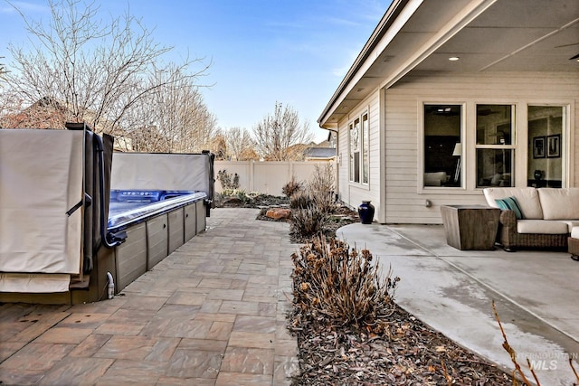 view of patio with a hot tub