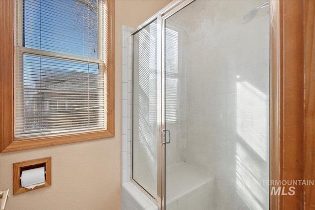 bathroom featuring a stall shower