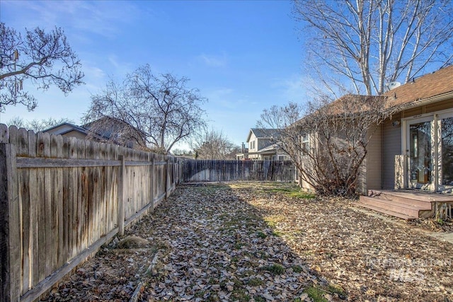 view of yard featuring a fenced backyard