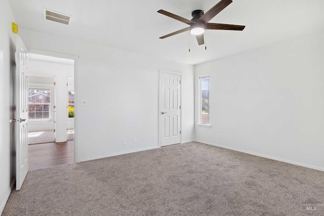 1590 Saddler St, Twin Falls, ID 83301 - spare room featuring carpet floors, a ceiling fan, and baseboards