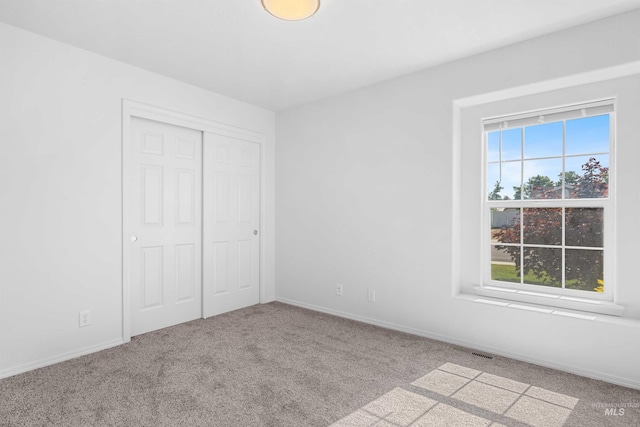 1590 Saddler St, Twin Falls, ID 83301 - unfurnished bedroom with carpet flooring, a closet, and baseboards