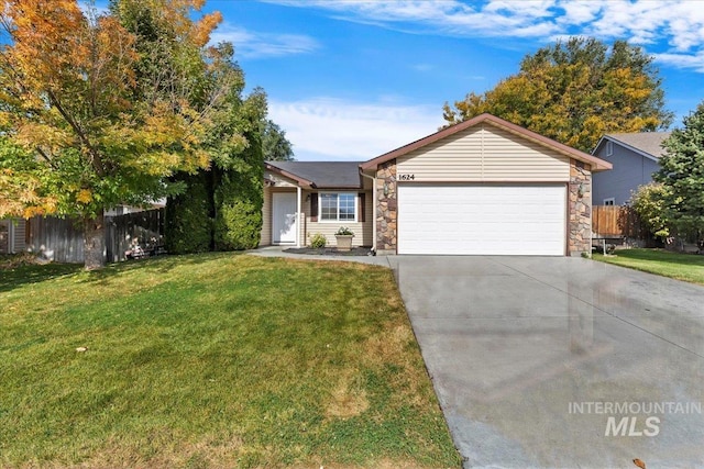 ranch-style home featuring a front yard and a garage